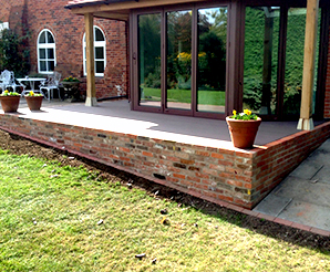 Sleeper and brickwork retaining walls